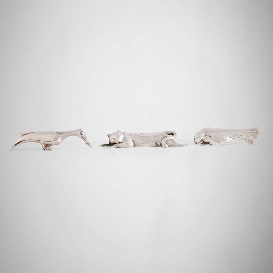 233_4_une_vision_moderne_design_from_a_european_country_home_january_2025_edouard_marcel_sandoz_gallia_animalier_figural_knife_rests_set_of_twelve__wright_auction.jpeg